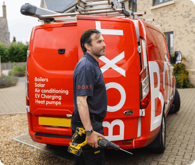 A BOXT van outside a house 