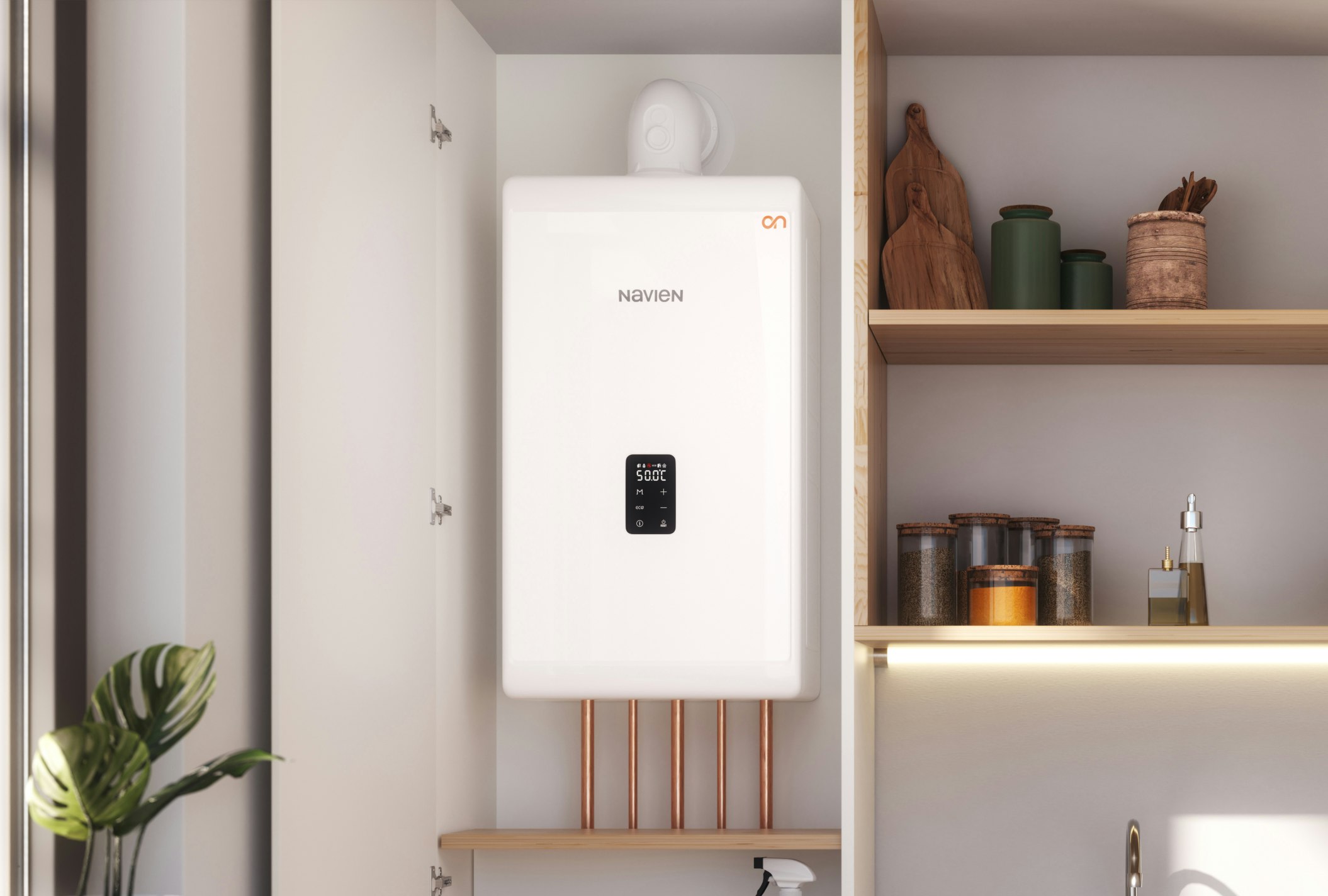 A Navien combi boiler installed in a kitchen cupboard