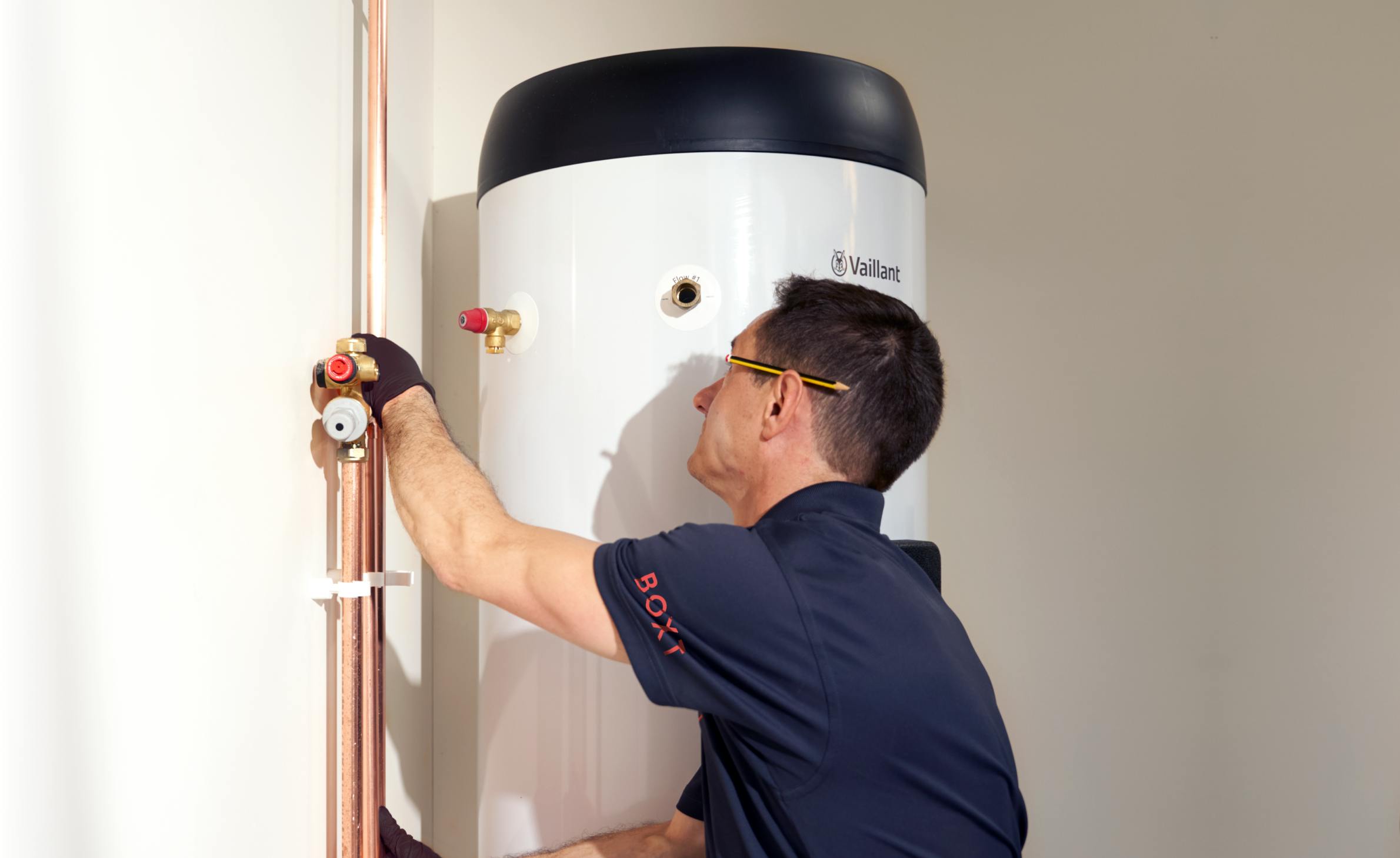 Engineer installing indoor unit