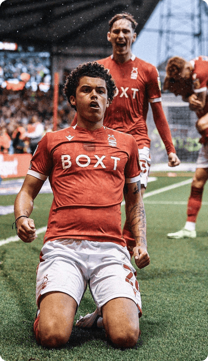 A Nottingham Forest player with a BOXT sponsorship logo on their shirt