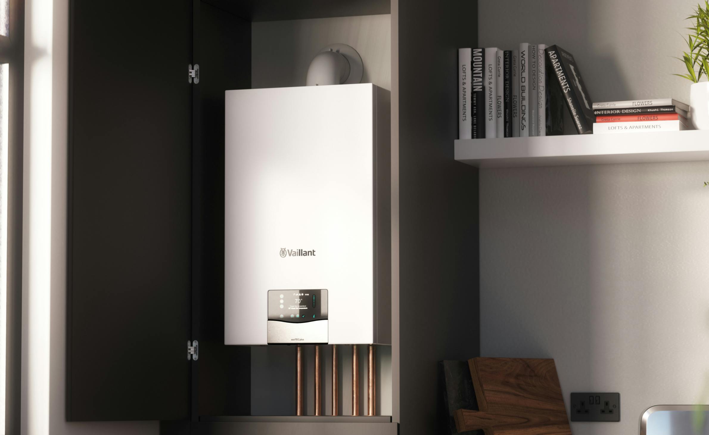 a Vaillant boiler installed in a kitchen cupboard