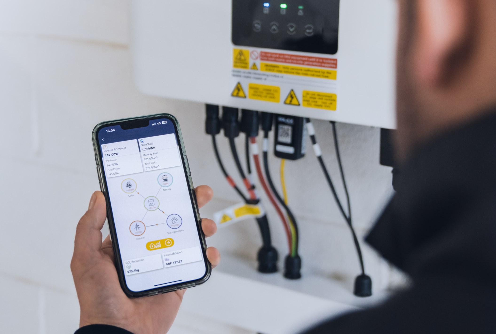 Engineer monitoring energy through an app