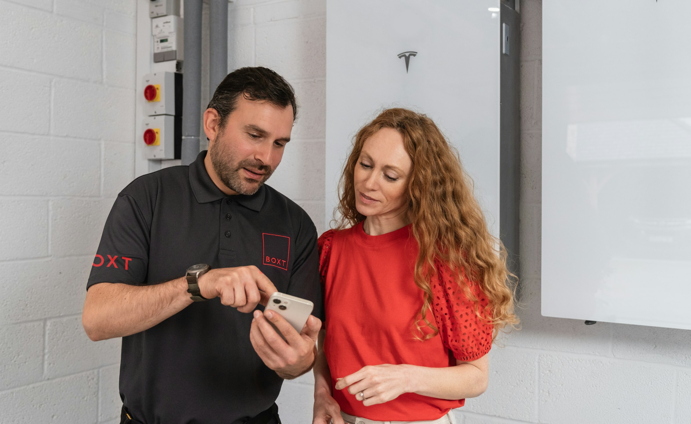 BOXT engineer showing a customer how the system works