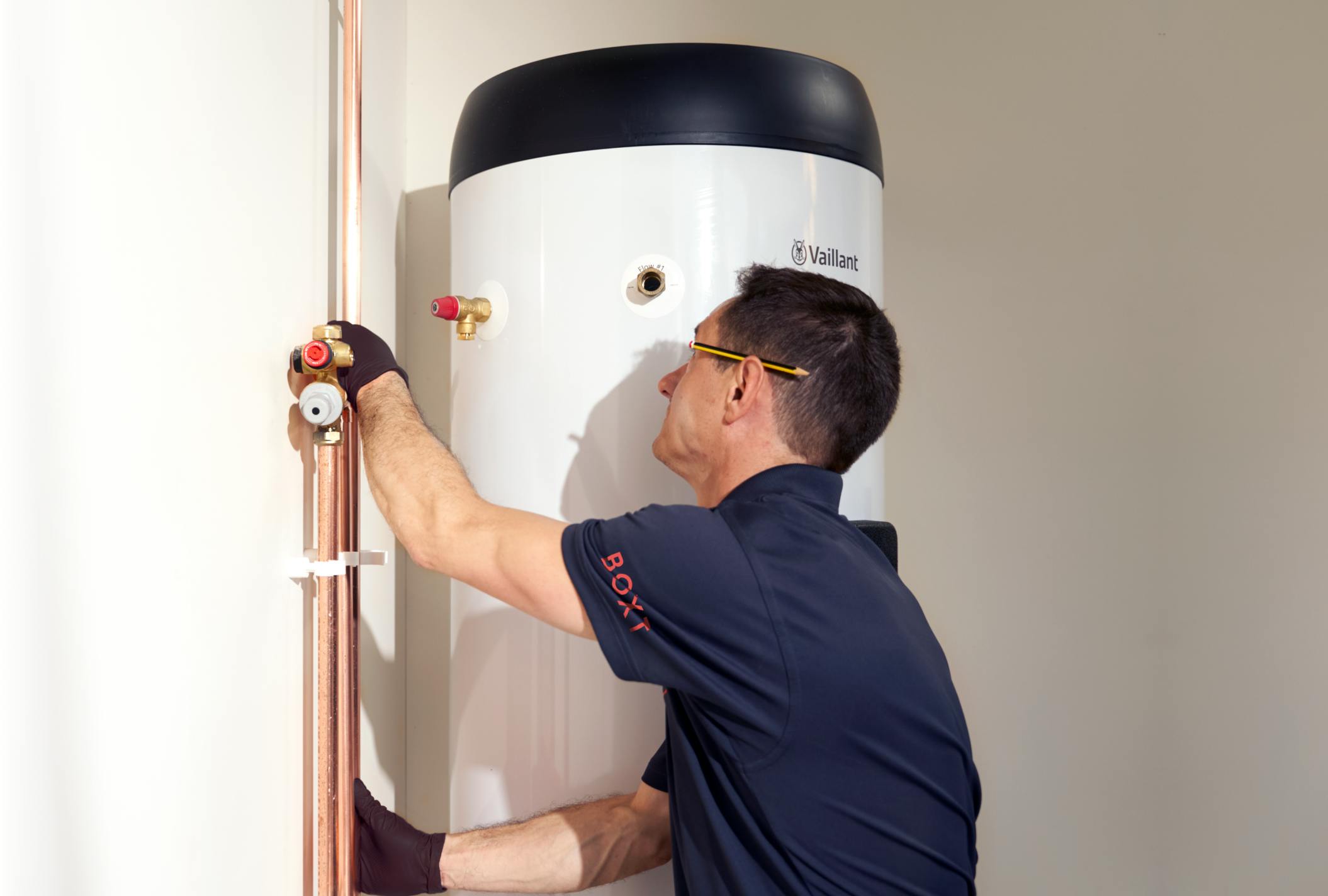 Engineer installing indoor unit