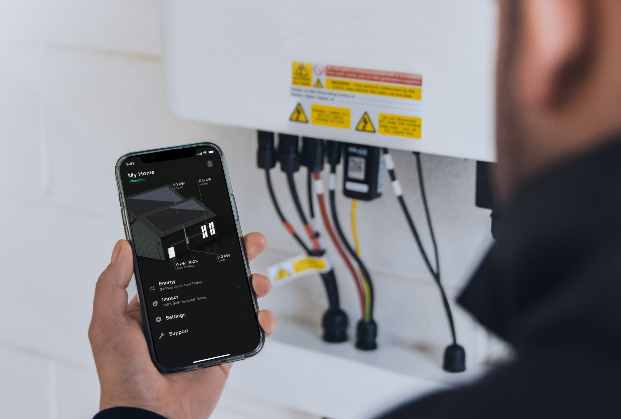 Engineer monitoring energy through an app