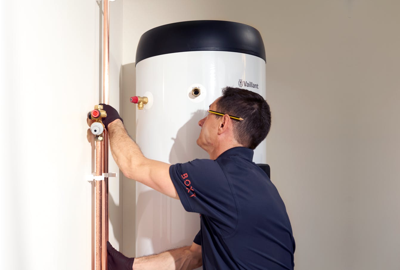 Engineer installing indoor unit