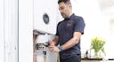 a BOXT engineer installing a new boiler and filter
