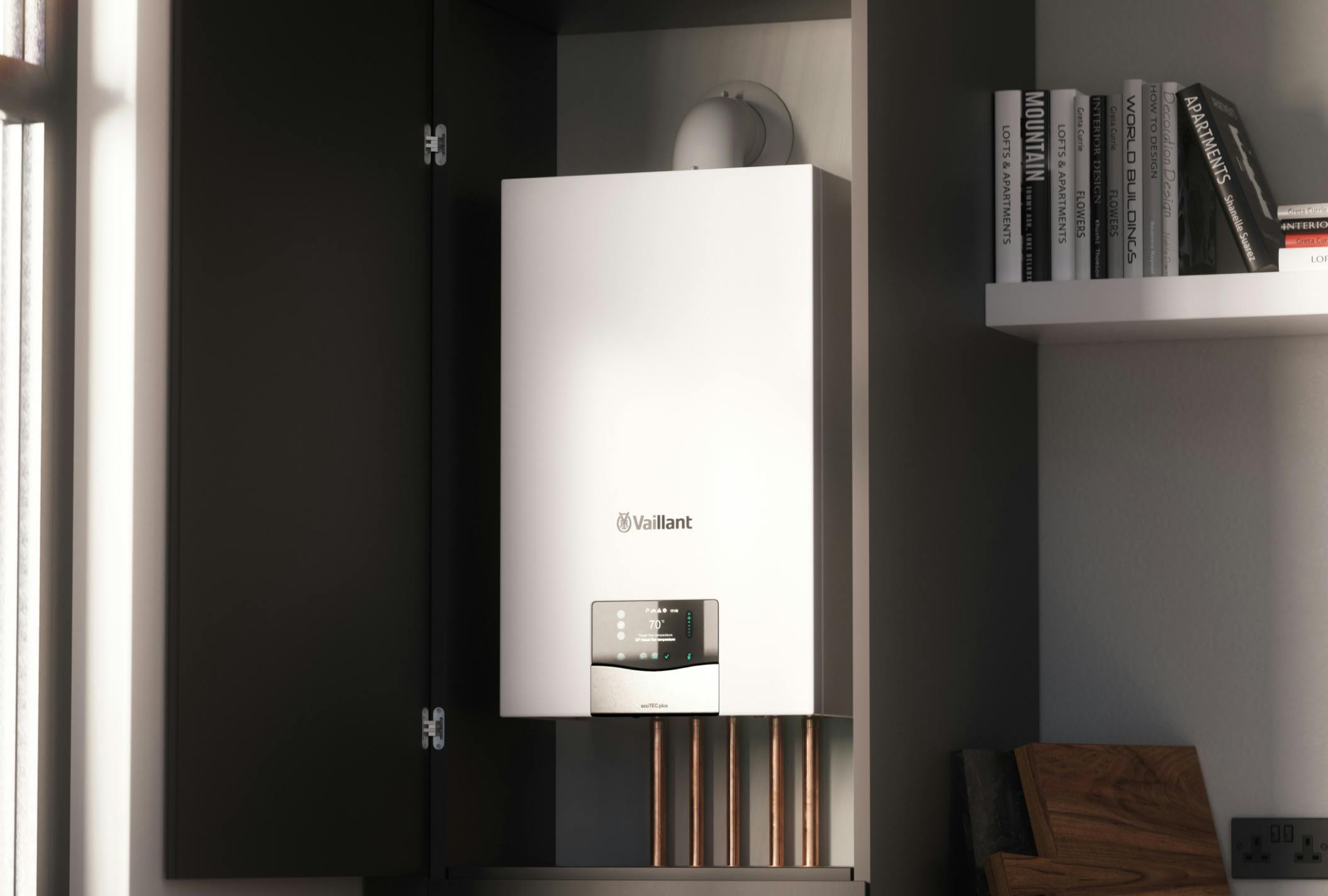 a Vaillant boiler installed in a kitchen cupboard